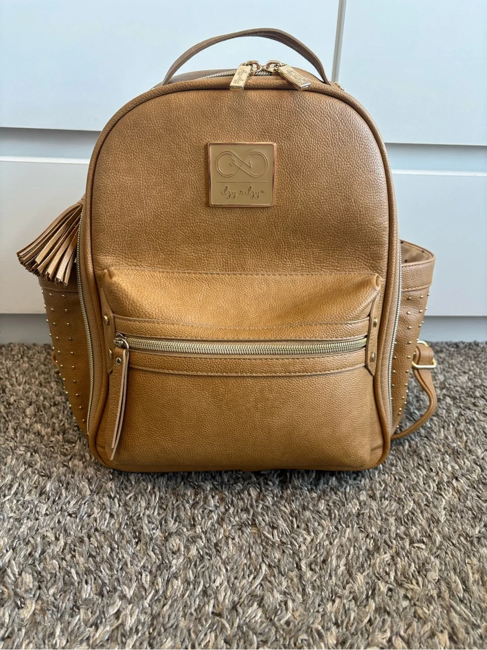 Itzy Ritzy Tan Faux Leather Baby Backpack